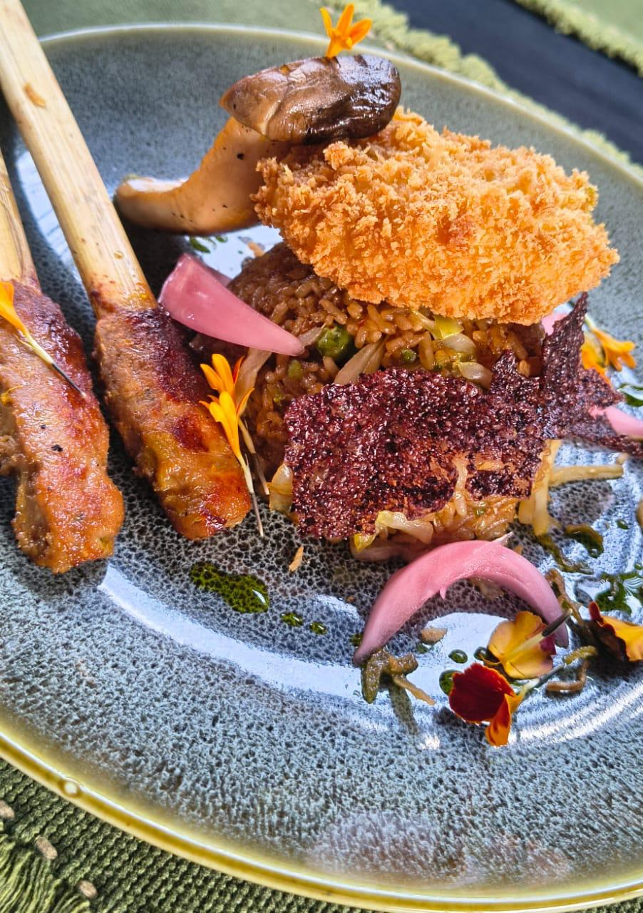 Orama fried rice with satay skewers, pickled onion and herbs